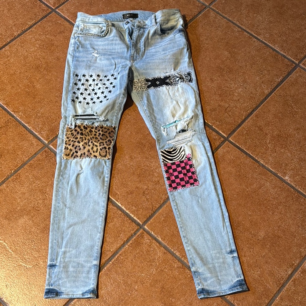 AMIRI Blue Slim Jeans with Star Pattern and Distressed Design
